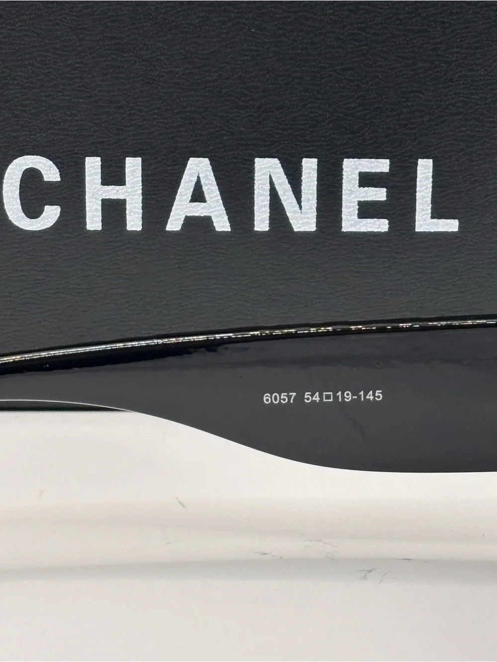 CHANEL Black Shield Sunglasses with Purple Gradient Lenses